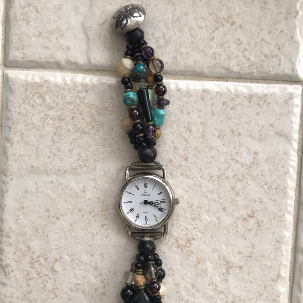 Watch with gemstone band